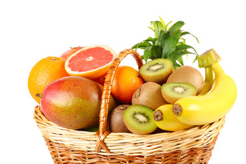 Assortment of fruits in basket isolated on white
