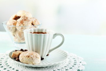 Cup of coffee and tasty cookies