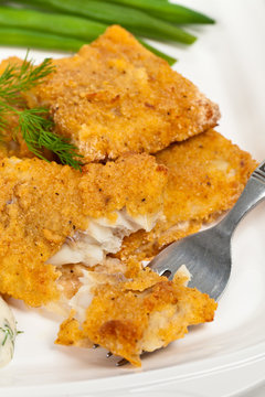 Breaded White Fish Fillets. Selective Focus.