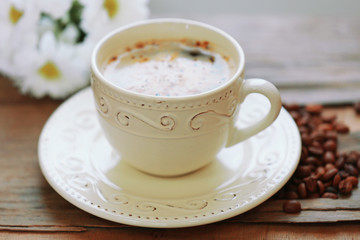 Cup of coffee on table close-up