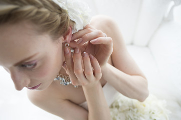 Bride you are wearing earrings