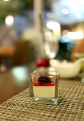 Dessert cake on a food's table.