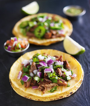 authentic mexican tacos with carnitas and barbacoa