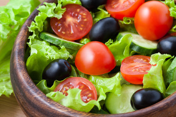 Superfood vegetarian salad with tomato and olives