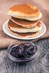 homemade pancakes with currant jam. Selective focus
