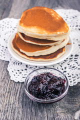 homemade pancakes with currant jam. Selective focus