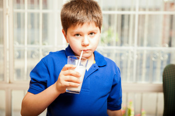 Drinking milk with a straw