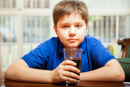 Little Boy Drinking Soda