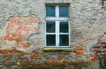 Old house wall with window