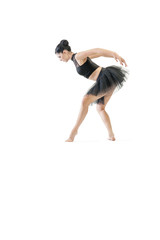 Obraz na płótnie Canvas Young attractive ballerina doing alternate dance moves