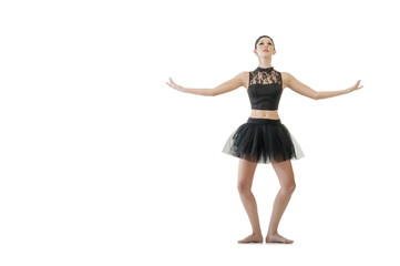 Young attractive ballerina doing alternate dance moves