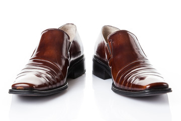 Brown leather fashion shoes isolated on white