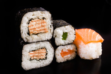 sushi over black background