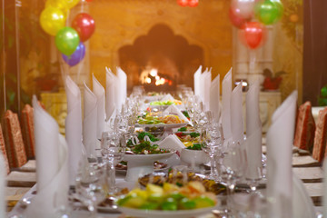 Banquet table near the fireplace
