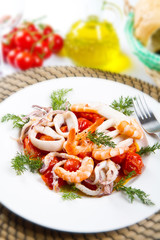dish with tomatoes and squid