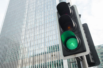 Green, Yellow and Red Traffic Light in the London city..