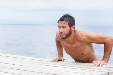 Portrait of Handsome Man with No Shirt at the Sea - 79678684