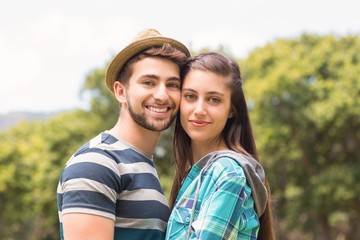 Fototapeta na wymiar Young couple smiling at camera