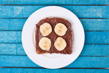 bread with chocolate spread and banana