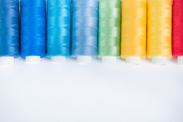 Colored threads on a white background