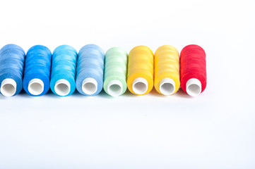 Colored threads on a white background