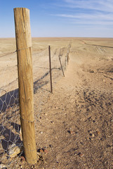 Dingoe fence in the Australian Outback.