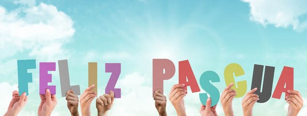 Composite image of hands holding up feliz pasqua