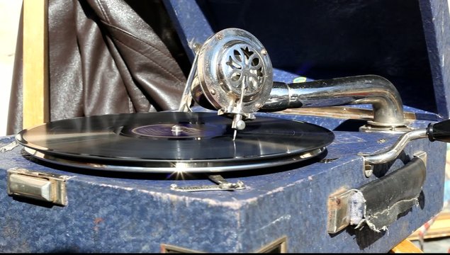 record playing in gramophone