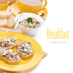 toasts with tuna and homemade cheese, coffee with milk and egg