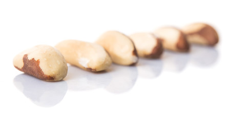 Brazil nuts over white background