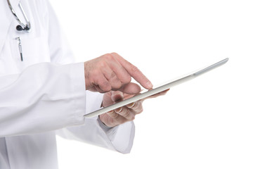 Close up male medical doctor using digital tablet pc. Isolated o