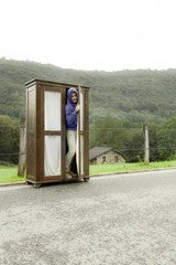 wooden wardrobe, man inside