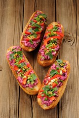 Vegetarian sandwiches with beetroot, bell pepper, parsley and sc