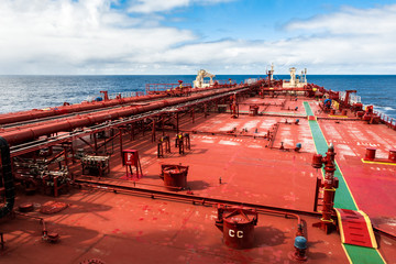 Oil transoprtation vessel is underway in sea © momentscatcher