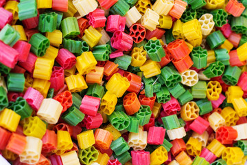 Background of colorful pasta as texture, close-up.