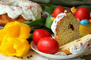 Easter cake, painted eggs and tulips.