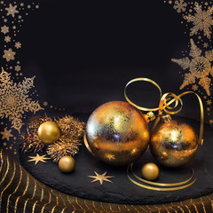 Golden Christmas decorations on winter background