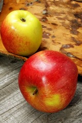 red apples on a wooden background