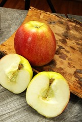 red apples on a wooden background