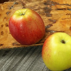 red apples on a wooden background