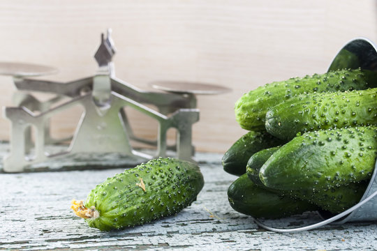 Cucumbers on a wooden background