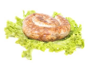 ring home sausages on green juicy salads