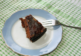 Chocolate cake on a porcelain plate