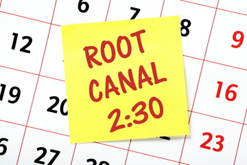 Root Canal appointment at the dentist reminder on a calendar