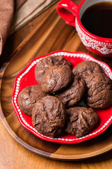 Homemade chocolate cookies on red plate