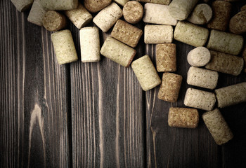 Wine corks on wooden background