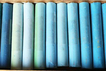 Colorful chalk pastels in box close up