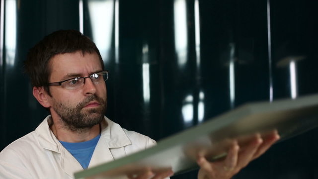 Scientist performing an  experiment in a quantum optics lab