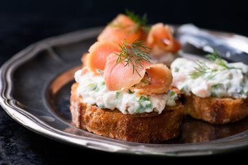 Canapes with smoked salmon and cream cheese spread