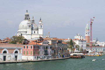 Fototapeta na wymiar Santa Maria della Salute basilica and city skyline in summer Ven